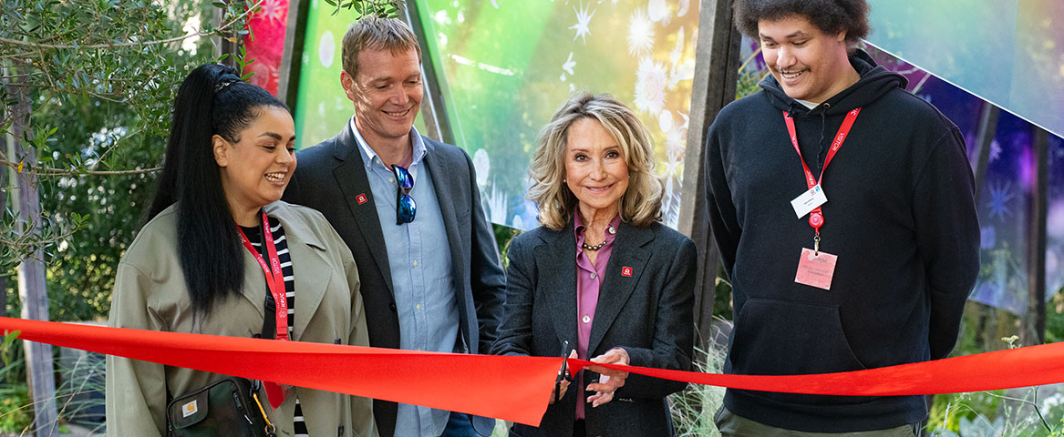 King’s Trust Ambassador Felicity Kendal is cutting a red ribbon for The King’s Trust: Seeding Success Garden which officially opened at Uxbridge College. She is joined by King's Trust staff and other partners.