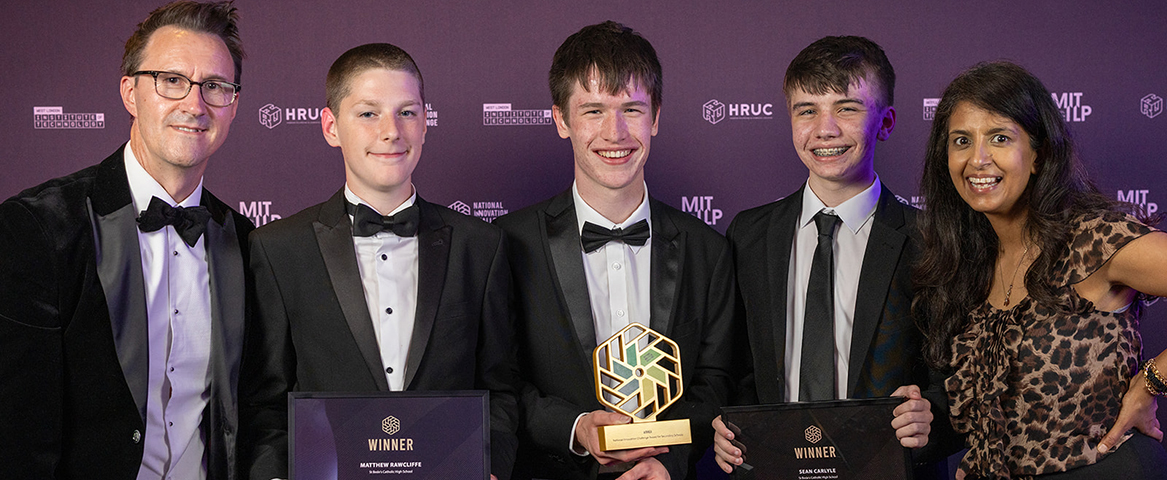 Secondary School Category winners for the National Innovation Challenge - Robert O'Callaghan, Matthew Rawcliffe and Sean Carlyle from St Bede’s Catholic High School in Lancashire; with Konnie Huq and Keith Smith.