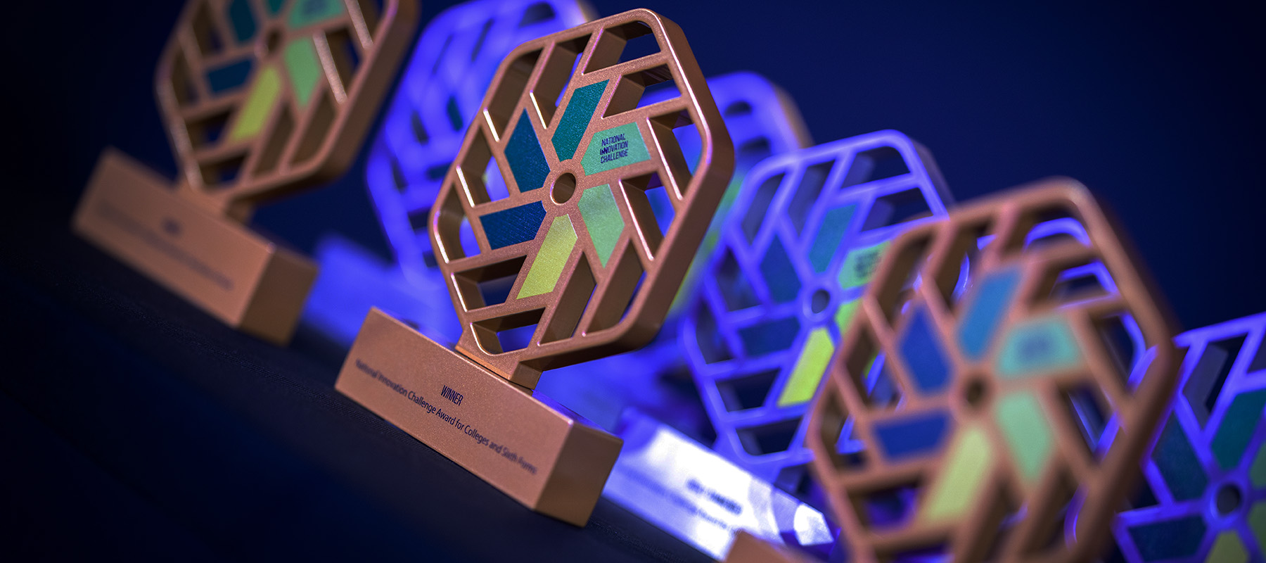 National Innovation Challenge trophies on a table