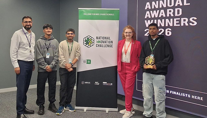 Yaseen Akhtar, Managing Director of the West London Institute of Technology, and Dr Niamh Shaw, NIC ambassador with our NIC 2026 winners from Uxbridge College. They are standing next to a NIC pull up banner.